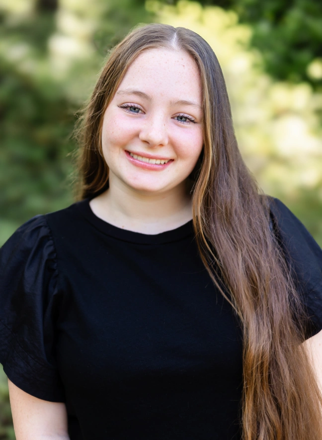 A young woman smiling