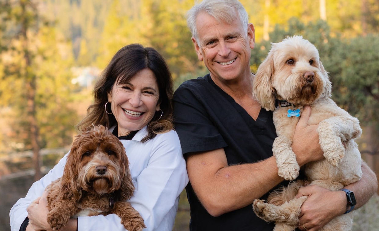 Dr. Galante and Dr. Cater with their dogs